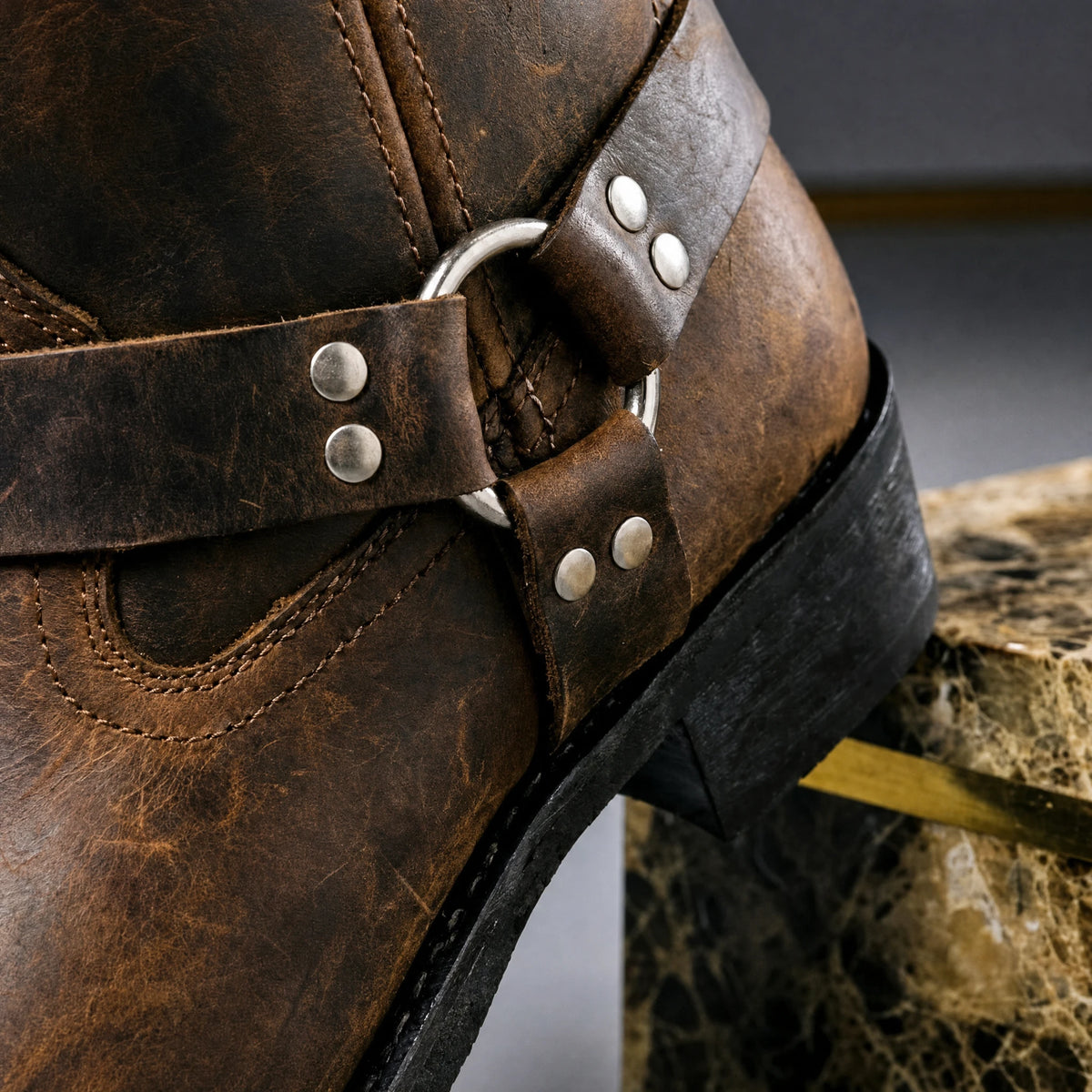 Harness ring and stud detail on cognac brown boot