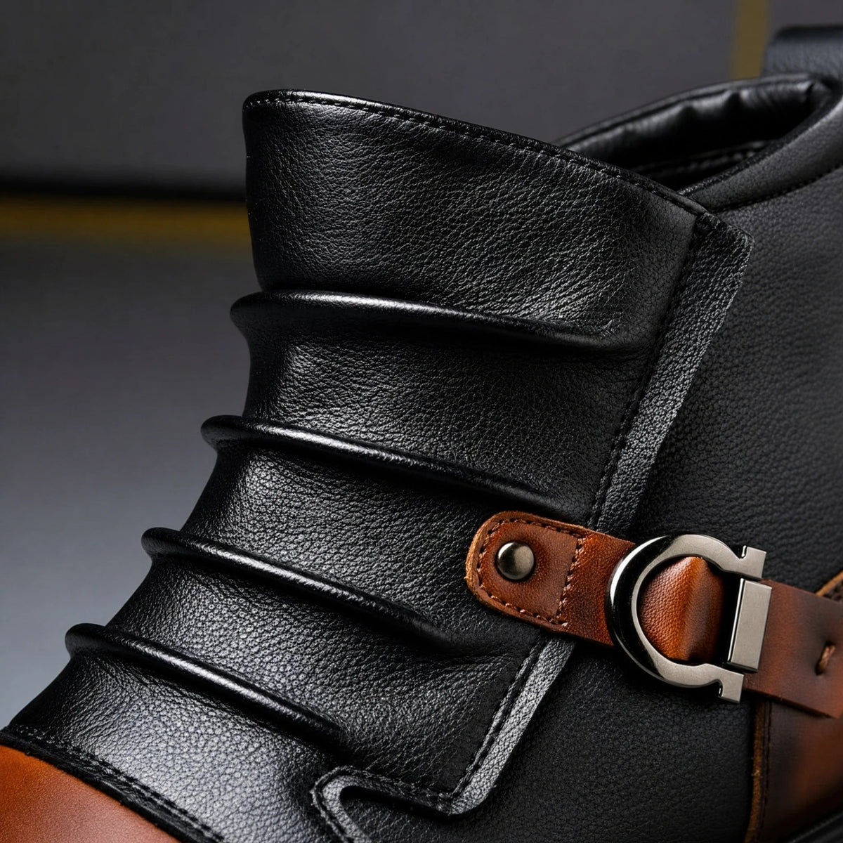 Pleated shaft and buckle strap detail on black two tone ankle boot
