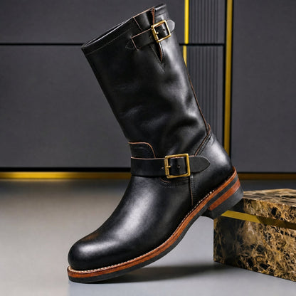 Black men's engineer boot with brass buckle straps, side view