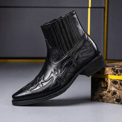 Black men's Western Chelsea boot with tooled stitching, side view