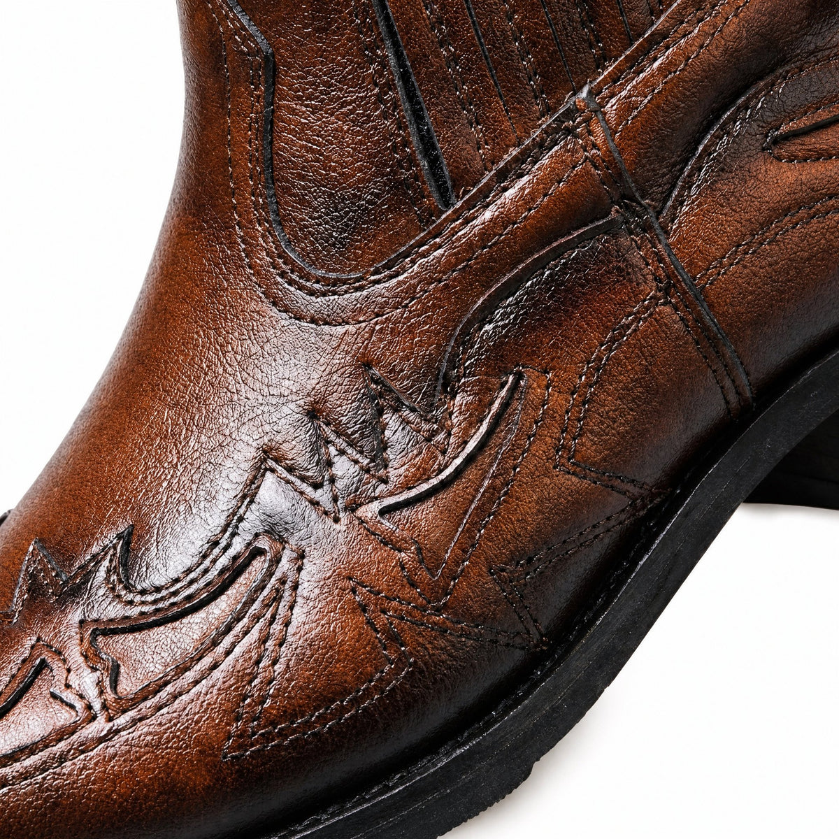 Tooled Western stitching detail on cognac brown Chelsea boot